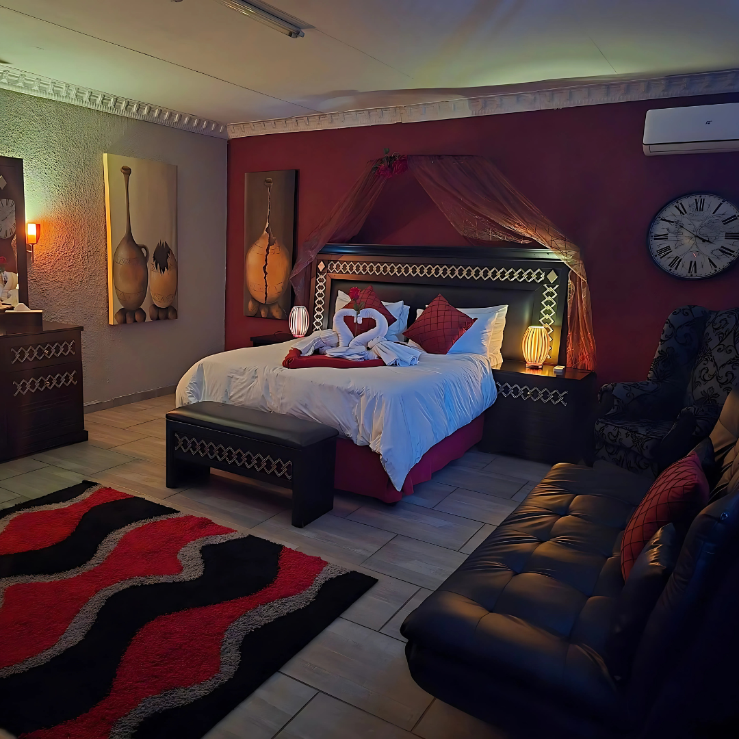 Luxurious guest room at Stilista Guesthouse in Randburg with romantic lighting, modern African décor, and 4-star accommodation amenities.